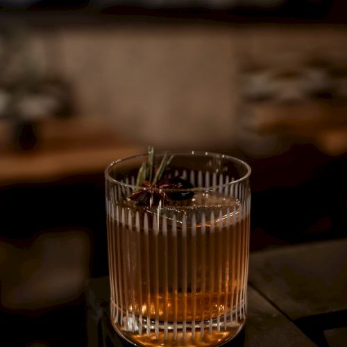 Whiskey signature cocktail with rosemary accent