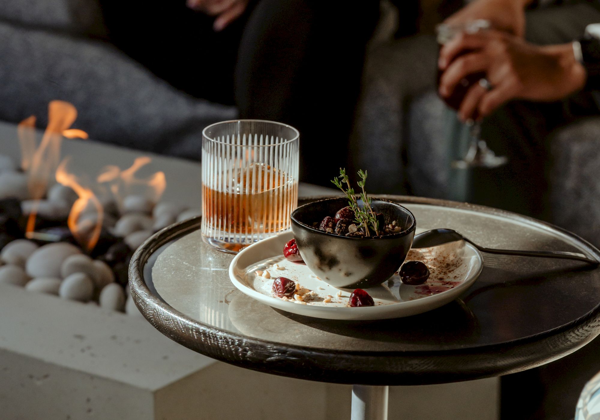 Chocolate pot de creme and whiskey cocktail with rosemary